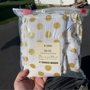 White with gold polka dots crib sheet and rail covers